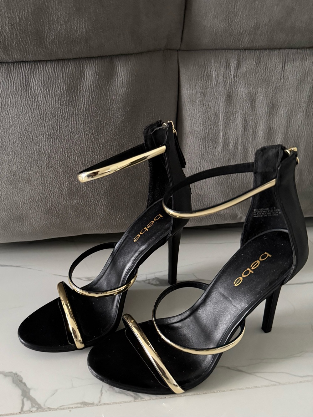 bebe Black and Gold High Heel Sandals